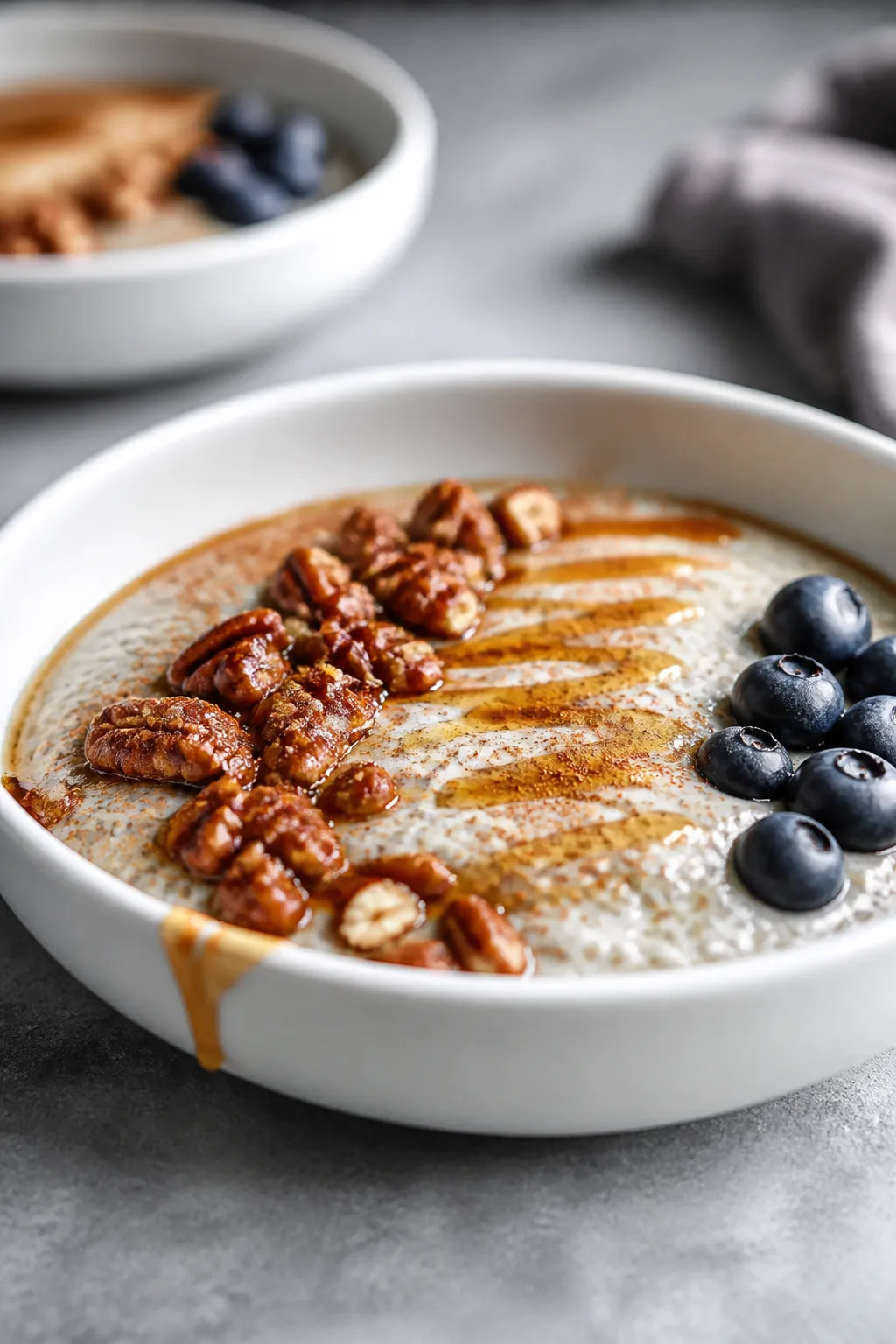 Final dish presentation: Restaurant-quality plated chia pudding served in a low, wide white bowl, te