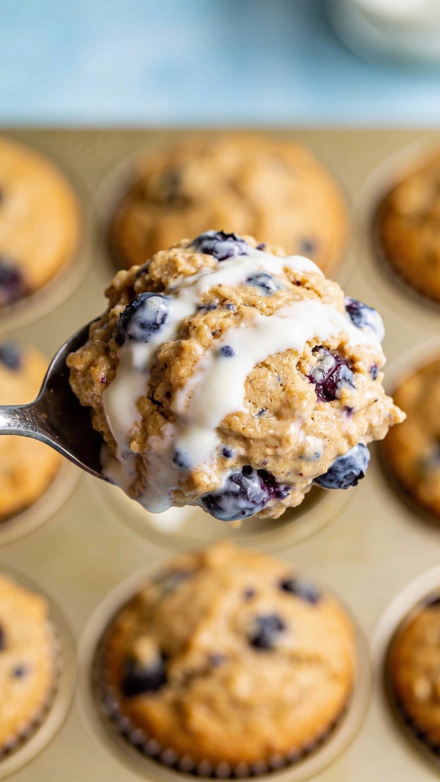 scoop of blueberry muffin batter with visible yogurt, overhead