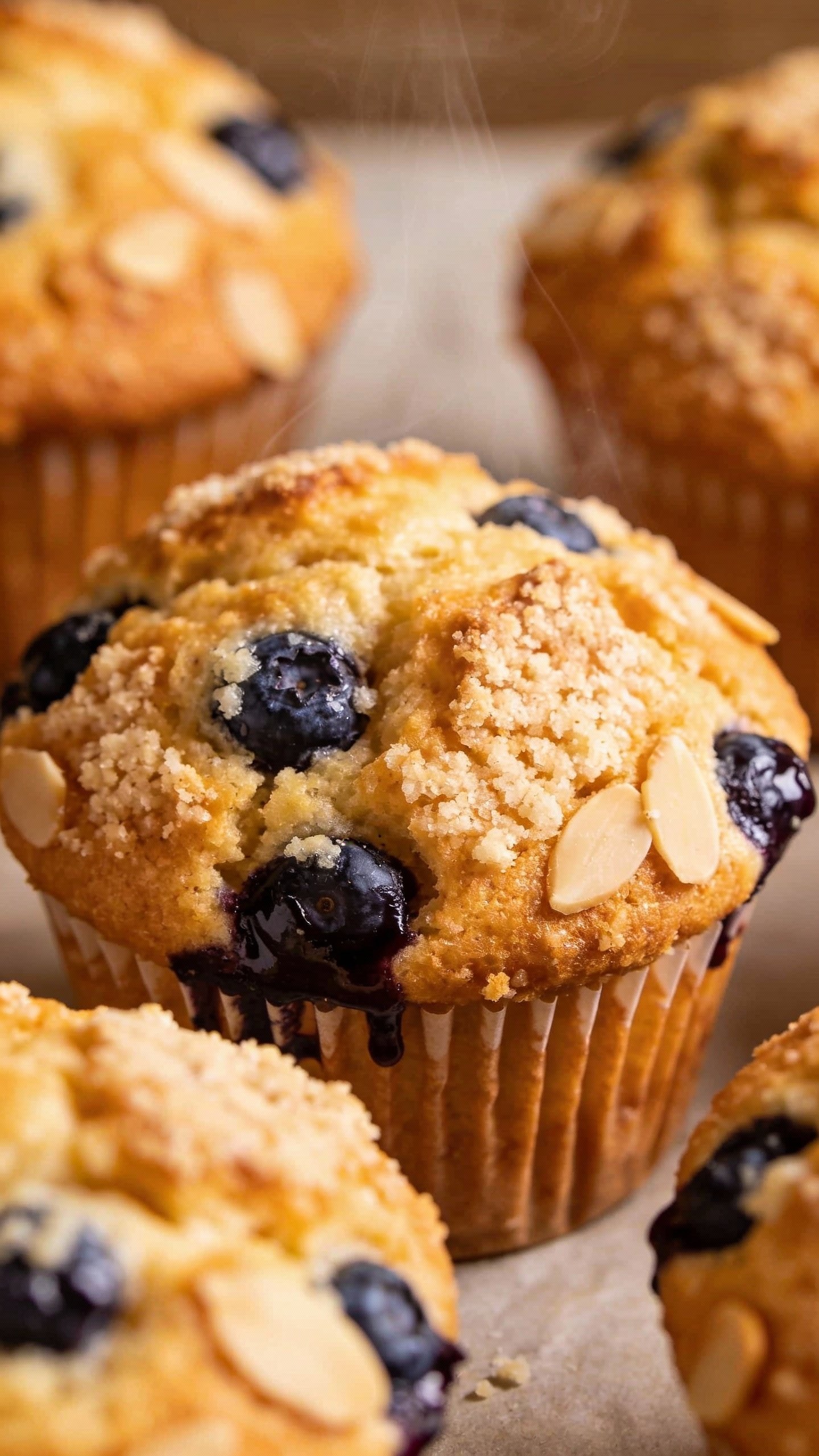 closeup almond flour blueberry muffin with golden crumb, bakery lighting