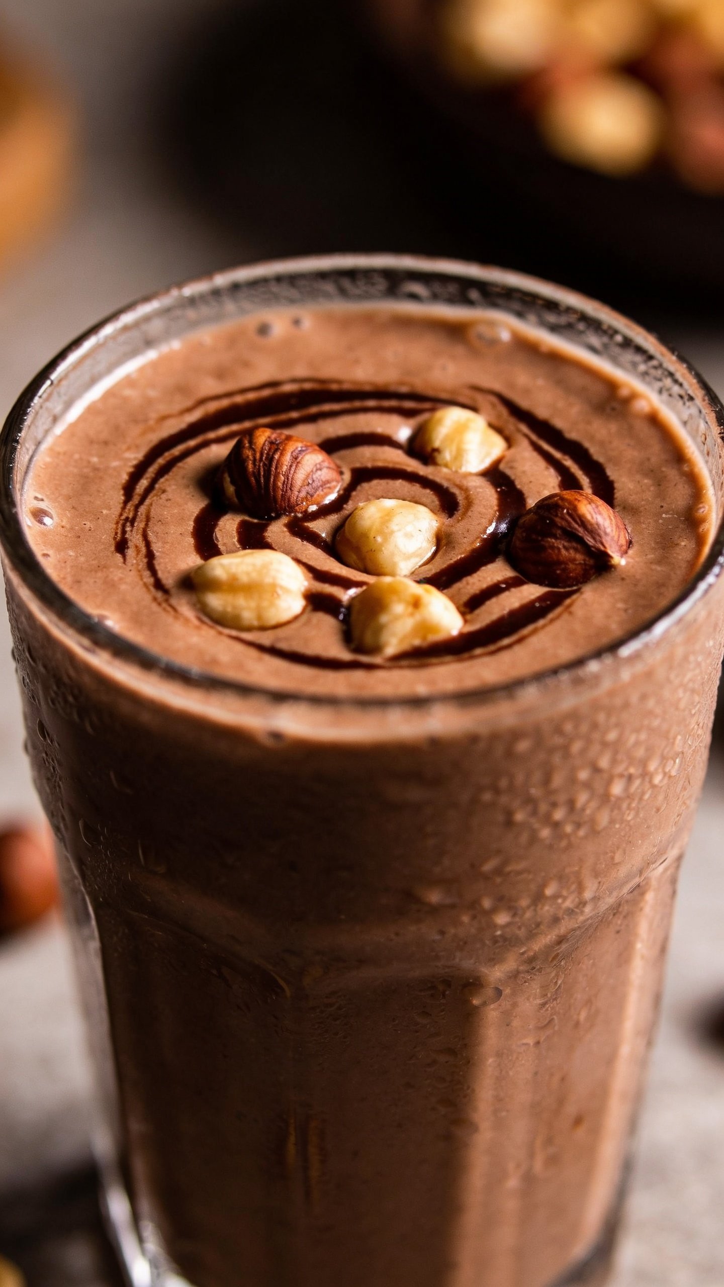 closeup of chocolate hazelnut smoothie in clear glass